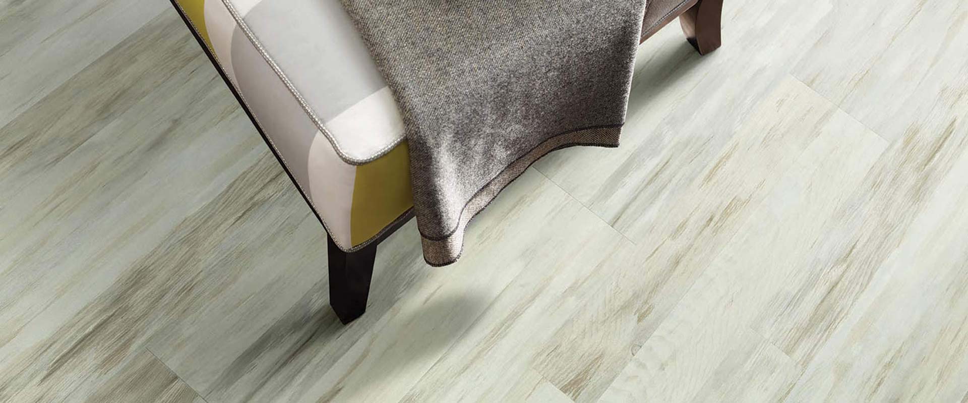 Laminate is an affordable option with the beauty of hardwood and the durability of vinyl.