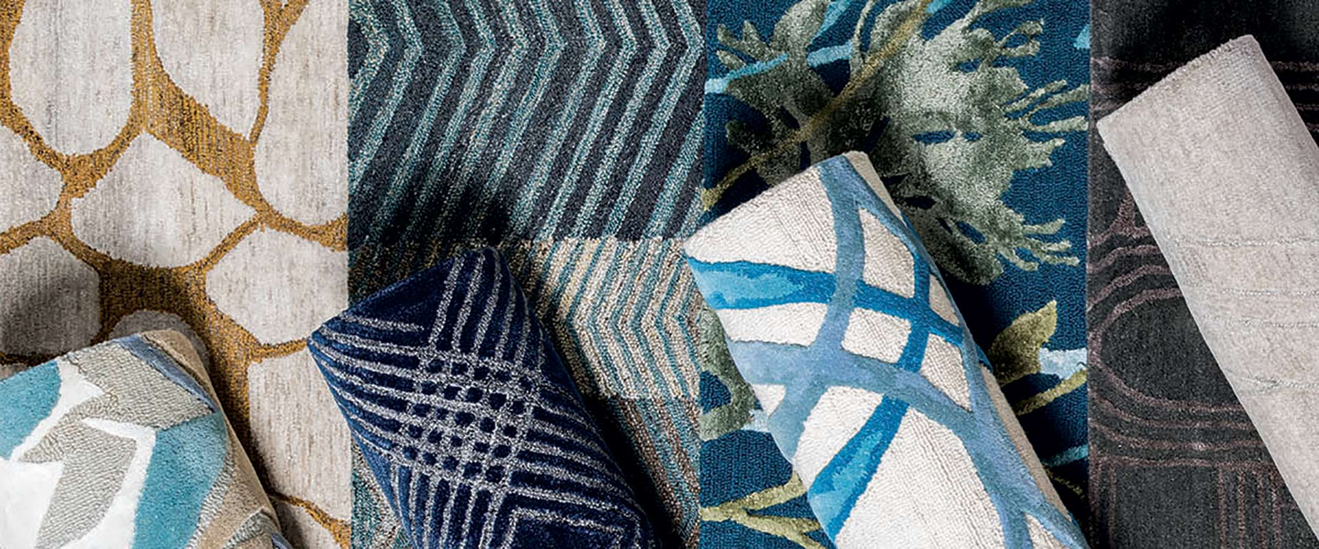 An area rug pulls the whole look of the room together - stop by today to see our selections!